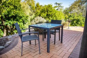 Gampi's outdoor seating area with bird bath