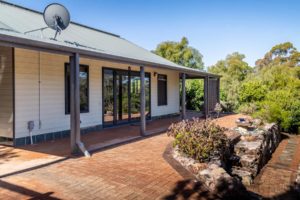 Front of the Gampi house showing garden walkway
