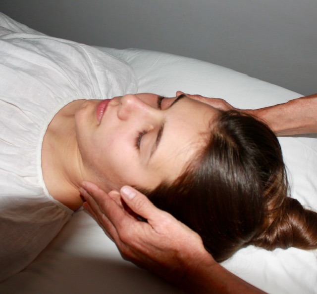 Reiki FINALJPG Woman receiving Reiki Massage